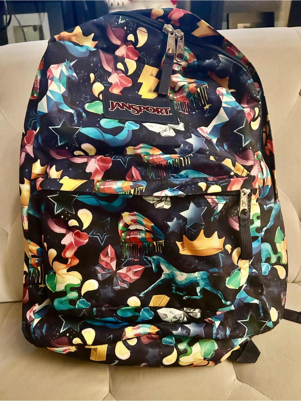 Jansport Blue Backpack with Various Graphics and Multicolor Print